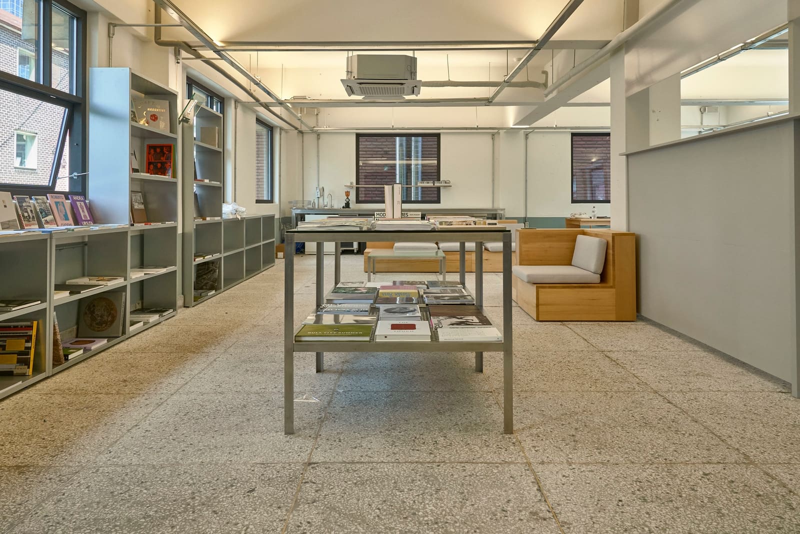 Bright interior with shelves and tables