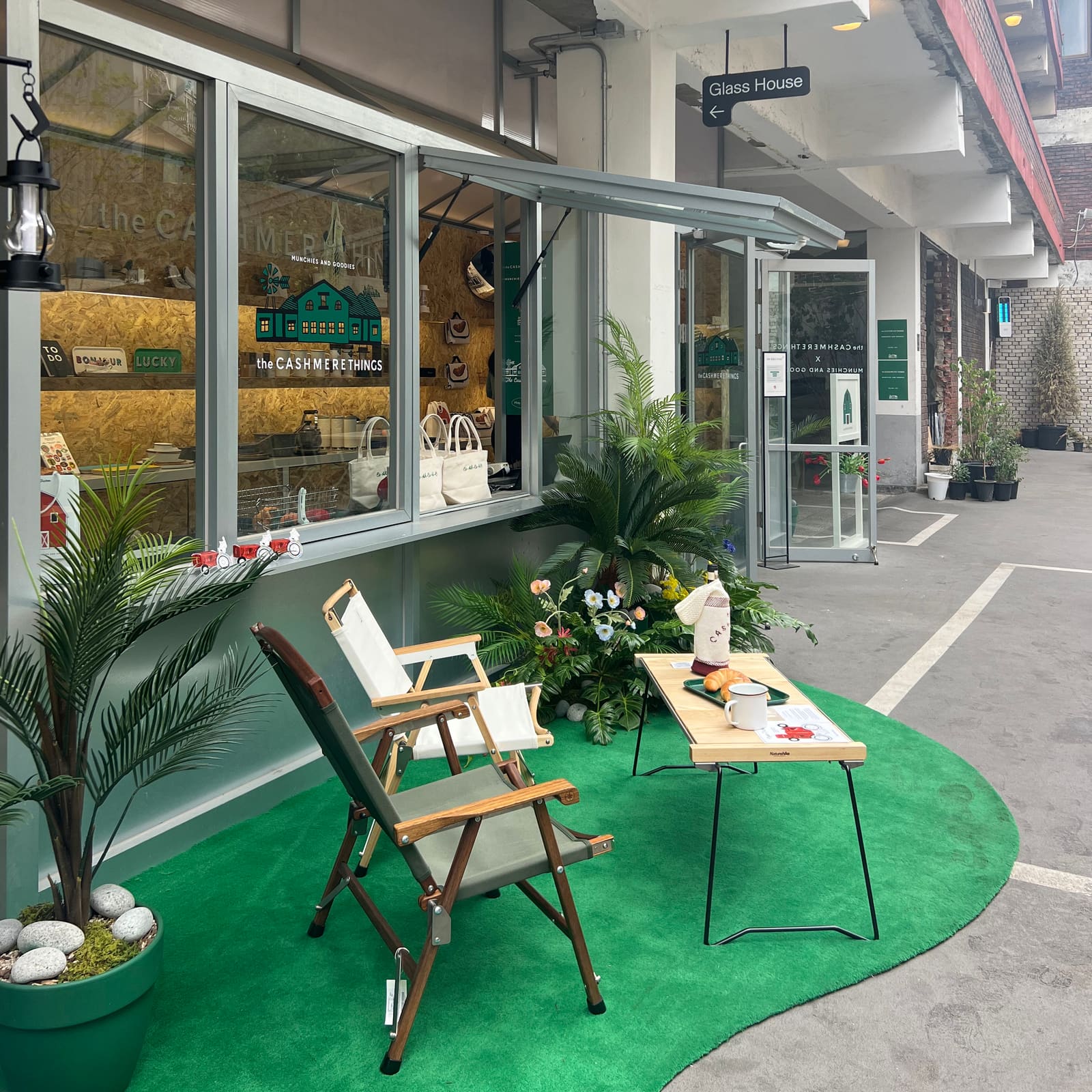 Glass House entrance and outdoor seating for the CASHMERE THINGS and Munchies and Goodies pop-up